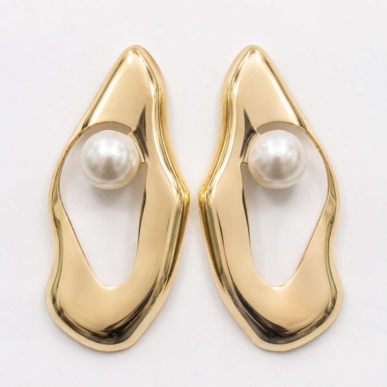 Sculpted Golden Pearl Statement Earrings