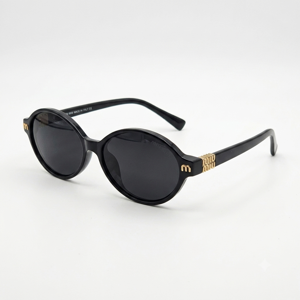 Classic Black Oval Sunglasses with Ornate Gold Hardware and Grey Gradient Lenses